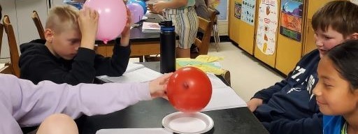 Students are experimenting in science class.